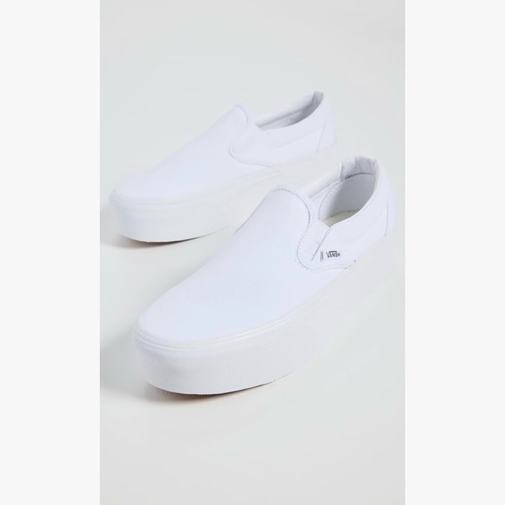 Vans Classic White Canvas Slip-Ons